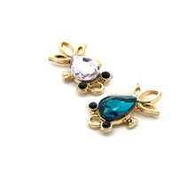 Blue and purple fish charm