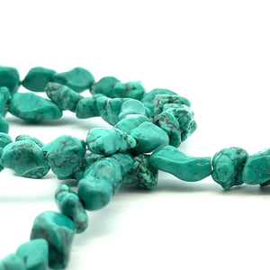 Turquoise Blue Stone SKU#M3151 W:1/2in   L:1/2in-7/8in
