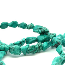 Turquoise Blue Stone SKU#M3151 W:1/2in   L:1/2in-7/8in