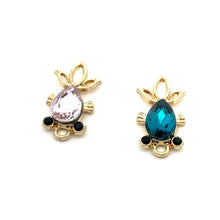Blue and purple fish charm