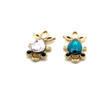 Blue and purple fish charm