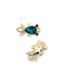 Blue and purple fish charm