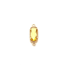Yellow oval shape crystal charm