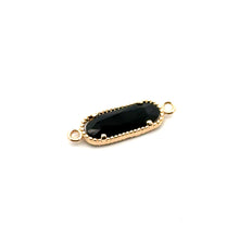 Black oval shape crystal charm