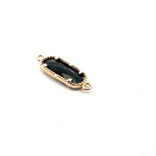Black oval shape crystal charm
