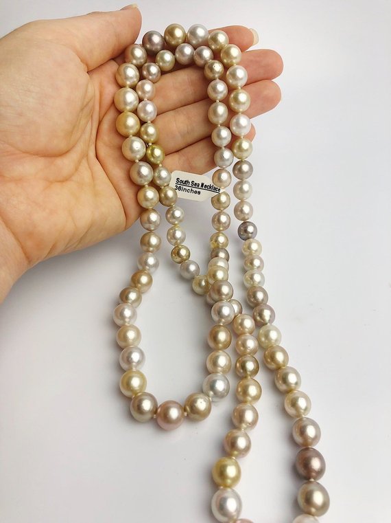 https://www.alohapearls.com/cdn/shop/products/il_570xN.1640597886_ksrz_570x.jpg?v=1544134926