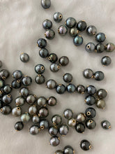 14k GF Tahiti Pearls, grommets set in Tahitian pearls.  100% natural colors Tahitian pearls set with 14k gold filled