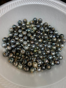 14k GF Tahiti Pearls, grommets set in Tahitian pearls.  100% natural colors Tahitian pearls set with 14k gold filled