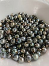 14k GF Tahiti Pearls, grommets set in Tahitian pearls.  100% natural colors Tahitian pearls set with 14k gold filled