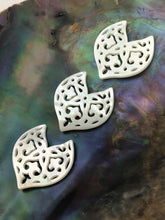 White carved Mother of Pearl Dolphin Tail