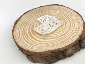 White carved Mother of Pearl Dolphin Tail
