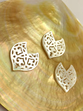 White carved Mother of Pearl Dolphin Tail
