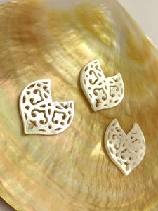White carved Mother of Pearl Dolphin Tail