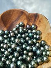 Stunning AA+ peacock Tahitian pearls, Round, 8-11mm