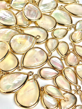 15.81 mm - 22.19 mm mother of pearl , SKU#M690-1 & M690-2