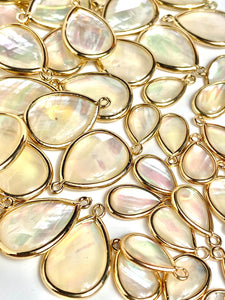 15.81 mm - 22.19 mm mother of pearl , SKU#M690-1 & M690-2