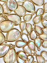 15.81 mm - 22.19 mm mother of pearl , SKU#M690-1 & M690-2