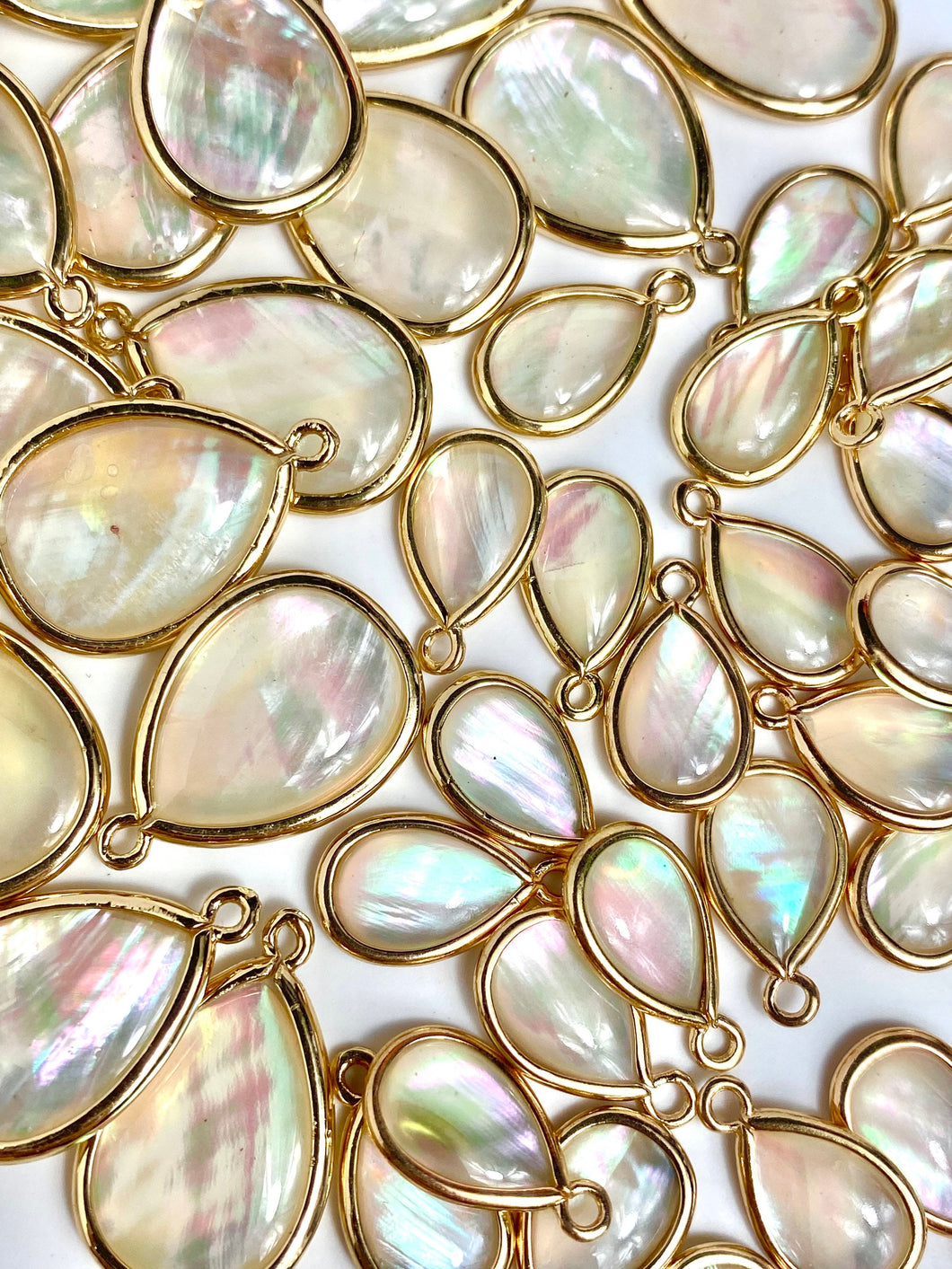 15.81 mm - 22.19 mm mother of pearl , SKU#M690-1 & M690-2