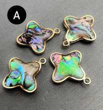 Abalone mother of pearl charm