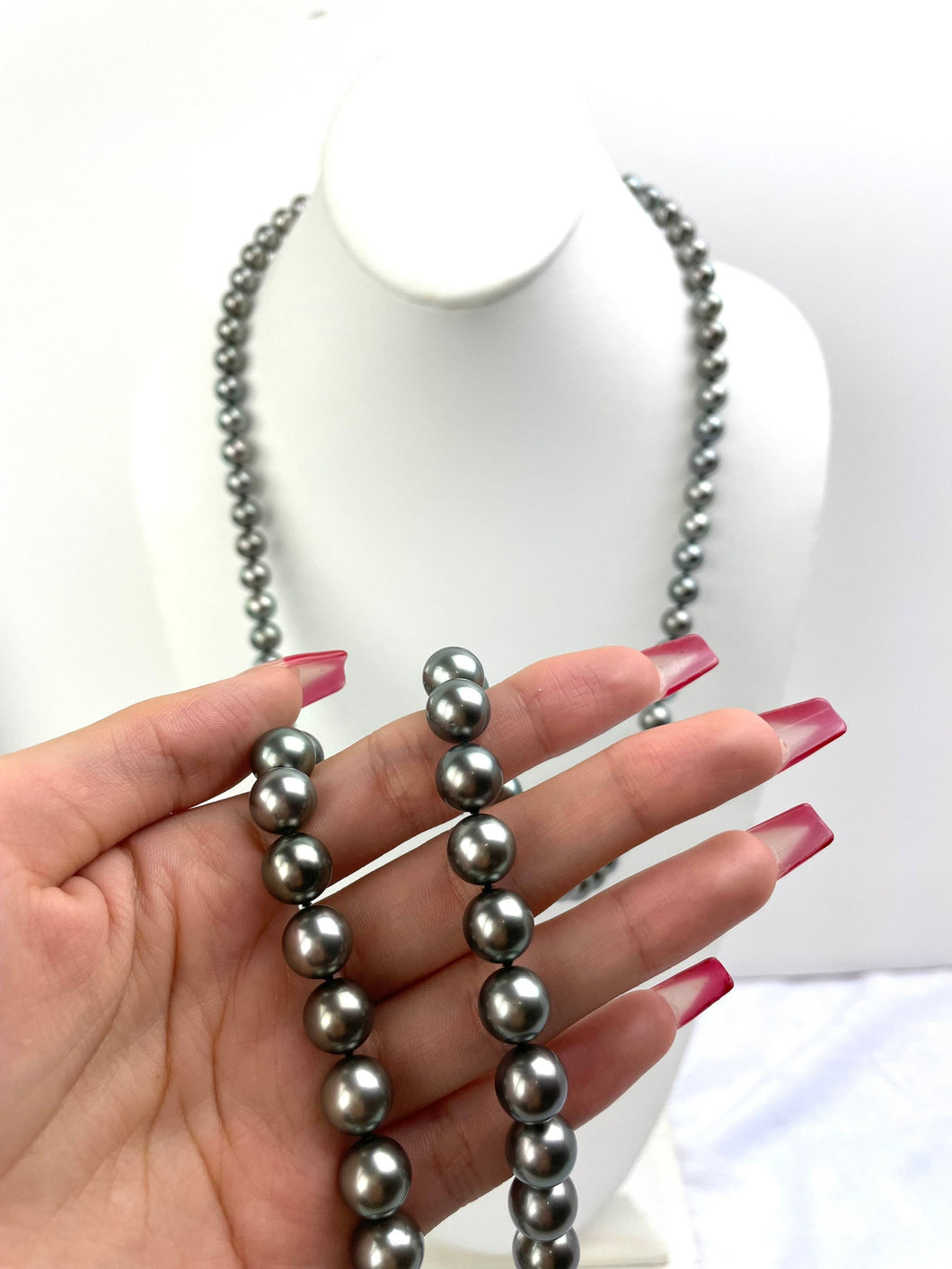 Mikimoto Tahitian Black pearl strand with original box and paperwork