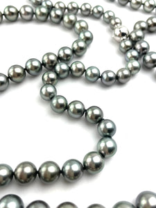 Mikimoto Tahitian Black pearl strand with original box and paperwork