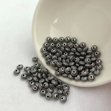 Corrugated Saucer Bead w/1.1mm Hole